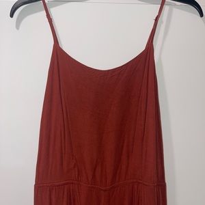 Rust/cider colored jumpsuit with wide leg splits